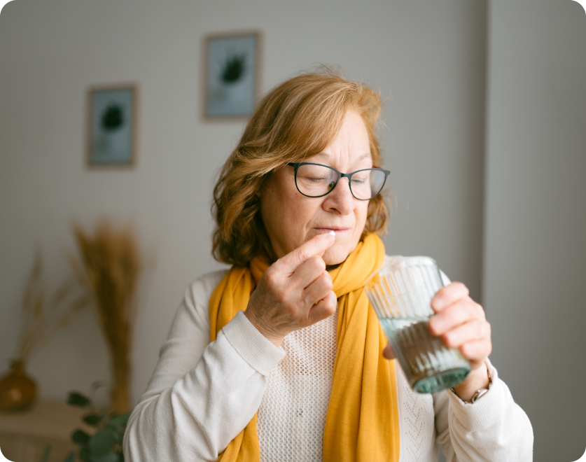 Woman taking medication